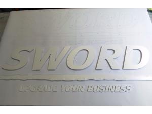 D�coupe lettrage en PVC blanc pour Sword Services SA � Renens