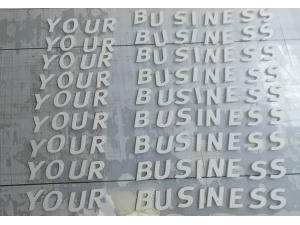 D�coupe lettrage en PVC blanc pour Sword Services SA � Renens